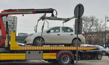 Mașinile parcate pe trotuar vor fi ridicate de poliție. Legea fost promulgată de Iohannis