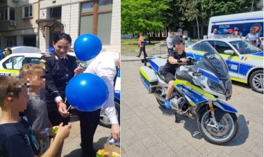Sute de copii au fost întâmpinați cu zâmbete, baloane și căldură de oamenii legii în Piața Ovidiu