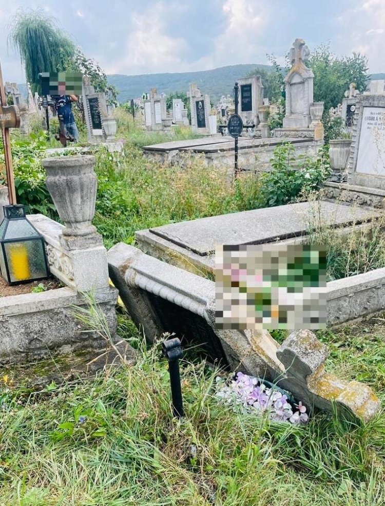 O femeie și-a pierdut viața după ce a fost strivită de o cruce într-un cimitir
